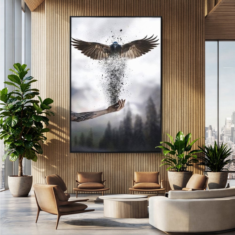 Tablou canvas cu tablou canvas cu pasare si mana din cenusa, in rama de aluminiu negru, pe perete intr-un birou